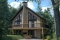 Rear view - BASE MODEL - Affordable mountain rustic cottage chalet house plan, 3-4 bedrooms, open loft, cathedral ceiling, 2 fireplaces - Skybridge 3