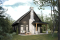 Rear view - BASE MODEL - Rustic cottage house plan with mezzanine, cathedral ceiling and bright, inviting open-concept living space - Laurentides