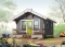 front - BASE MODEL - Low-budget small tiny one-bedroom cabin home plan, open floor plan, front balcony - Morning Breeze