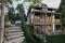 Rear view - BASE MODEL - Modern small cottage-style home plan with finished walkout basement, offering beautiful natural light - Bonzai 2
