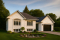 front - BASE MODEL - Split-entry house plan, economical, garage with storage, 2 to 4 bedrooms, optional finished basement ($) - Madeline