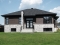 front elevation - Modern Single storey house plan, 2 bedrooms, large shower stall, large kitchen island, natural light  - Lotus
