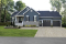 front - BASE MODEL - Country rustic 2-car garage house plan with open floor plan, large kitchen island, fireplace and laundry room - Ashbury 3