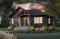 front - BASE MODEL - "Farmhouse bungalow house plan, master bedroom on the main floor, optional finished basement plan ($)" - Ripley 3