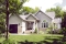 front - BASE MODEL - Bright country-style bungalow with open layout and garage – A cozy and functional home design - Kipling