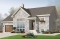front - BASE MODEL - Abundant windows, 17' ceiling, large family room and a garage - Lianne