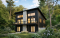 Rear view - BASE MODEL - Rustic Walkout Cottage Plan with a STÛV Wood Stove and Up to 4 Bedrooms - Dahilia 2