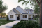 front - BASE MODEL - Small one bedroom house with attached RV garage, with option to convert RV garage into extra beds/baths - Nomad