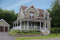 front - BASE MODEL - 3 to 4 bedroom Farmhouse style house plan, wraparound porch, home office, kitchen island - Cloverdale