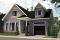 Color version 1 - Front - Affordable Cape Cod style house plan, 3 bedrooms, garage, kitchen with pantry, laundry room on main floor - Augusta