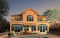 Rear view - BASE MODEL - Multigenerational house plan, one-bedroom apartment on main floor, two-story 3 bedroom for the family - La Hacienda 3