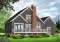 Rear view - BASE MODEL - Rustic country cottage home plan with garage, 3 bedrooms, fireplace, mezzanine, cathedral ceiling - Sunburst 4
