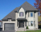 front - BASE MODEL - European house plan with garage, sun room, breakfast nook, fireplace, 3 bedrooms - Gouverneur