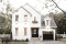 alternate - Elegant 2-storey French-style home with garage, fireplace, and island kitchen. - Italianate