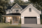 front - BASE MODEL - Farmhouse Home Design featuring 3 bedrooms, 2.5 bathrooms, garage with workshop area, and a covered terrace - Charlie