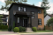 Color version 1 - Front - 2-story contemporary home, 3 bedroom and 1.5 baths, mud room, economical to build, open concept floor plan - Milot