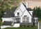 Color version 1 - Front - Tudor style house plan with 4 bedrooms, seperated master bedroom with tub, 2-car garage - The Quarry 3
