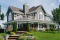 front - BASE MODEL - Beautiful lakefront home plan with home elevator, 5 bedroom with large master suite and double garage - Beaverhill