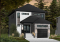 Color version 2 - Front - Modern house plan with garage, narrow lot design, great master suite, open layout, laundry on second floor - Stanton 2