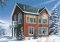 front - BASE MODEL - Compact 2 bedroom cottage home design with reverse floor plans, large second floor fireplace - Chamonix 2