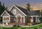 Rear view - BASE MODEL - Open floor plan lakefront Country Cottage, master bedroom on main, double sided fireplace & covered terrace - Suncrest