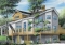 Rear view - BASE MODEL - A-France style lakefront vacation house plan, 3 bedrooms, 2 family rooms, mezzanine, garage - The Clearview 2