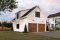front - BASE MODEL - 30x36 Country-Style Spacious 2-Car Garage with Loft Storage, Half Bath, Workshop Space and Covered Porch - Crossroads